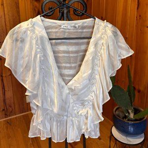 Saint + Secret's Low Cut Blouse